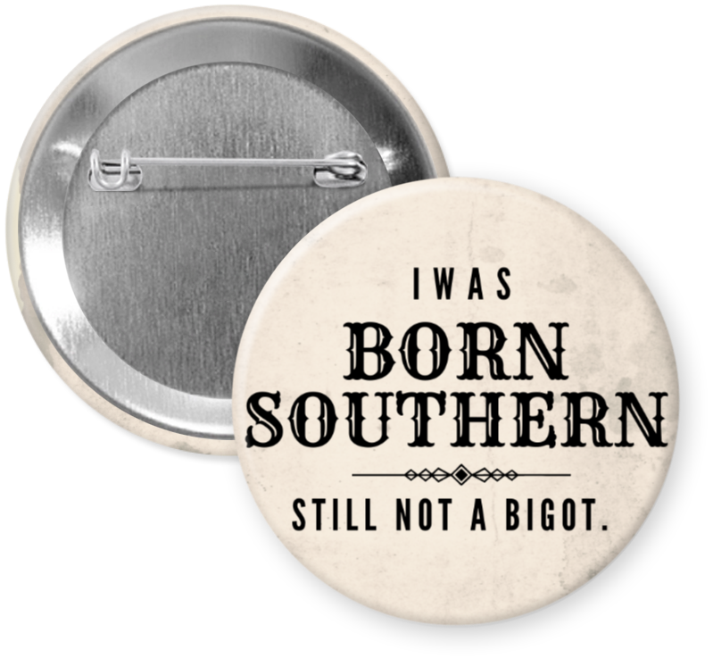 2.25 inch button reading Born Southern Still Not A Bigot in black text on a neutral background