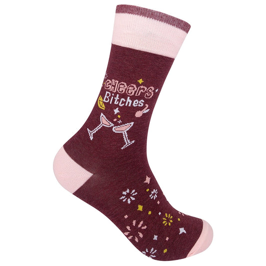 Maroon and blush pink crew socks with martini glass illustrations and the phrase "Cheers Bitches" surrounded by confetti

