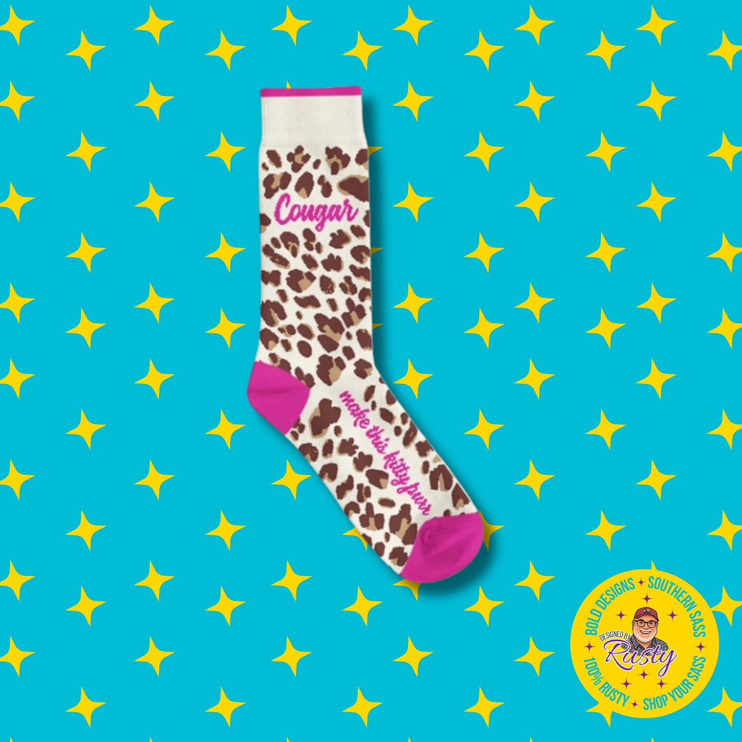 Leopard print crew socks with pink accents and “Cougar” text on turquoise background with yellow stars and Designed by Rusty logo.