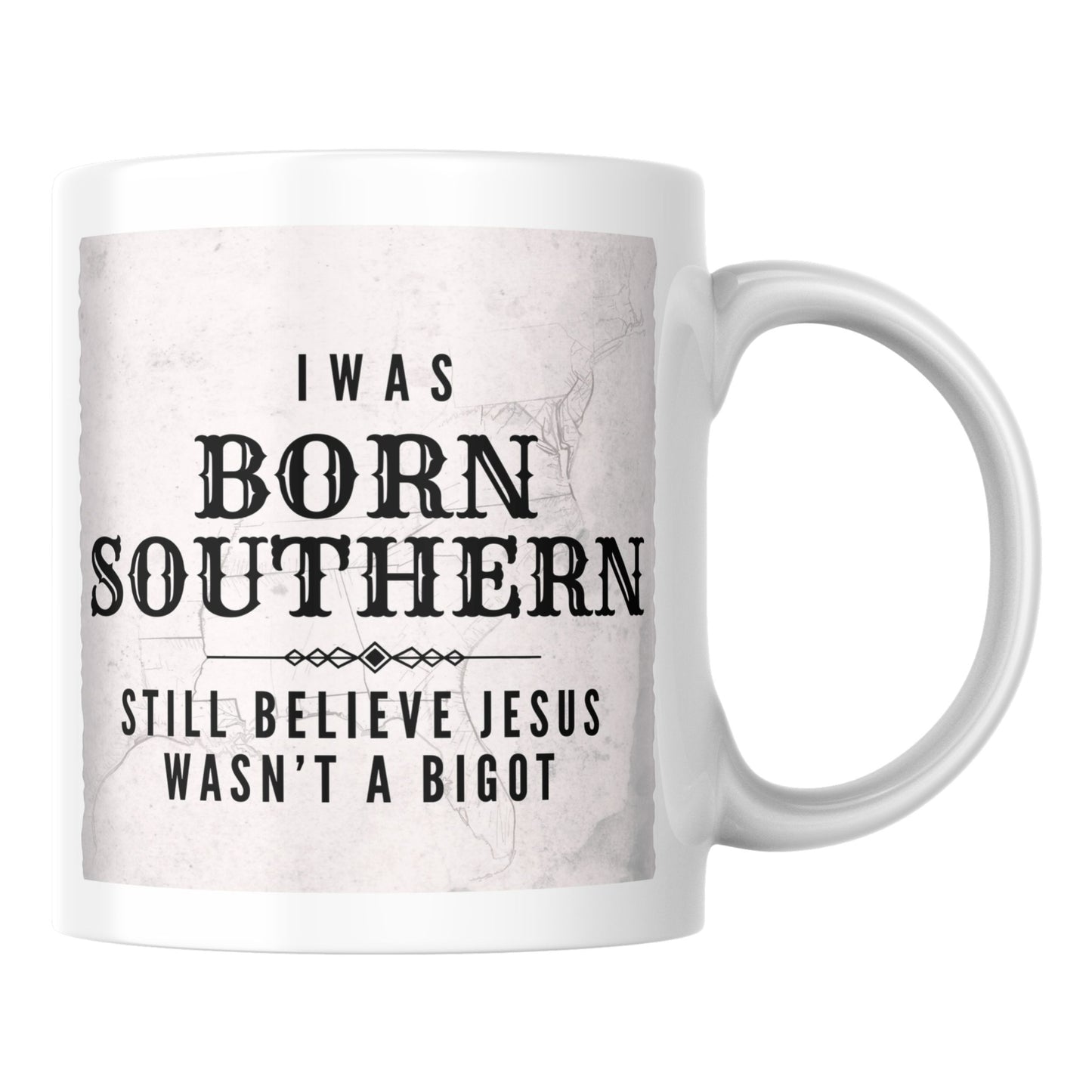 Primary: White ceramic mug with "Jesus Wasn't a Bigot" design on white background. Secondary: White ceramic mug with design on turquoise branded background with stars and DBR logo. Lifestyle: White ceramic mug displayed on a kitchen counter.