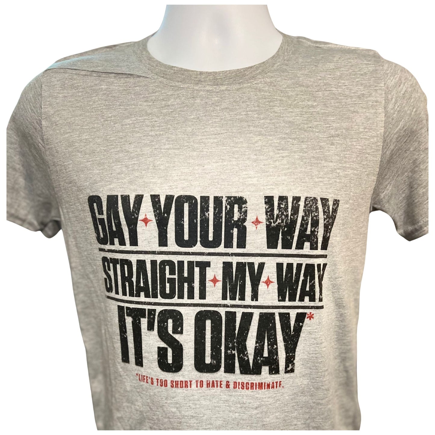 Gay Your Way text shirt in bold red and black on soft gray background