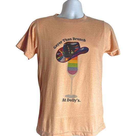 Peach T-shirt with “Gayer Than Brunch at Dolly’s” rainbow mimosa design and sequin cowboy hat,.
