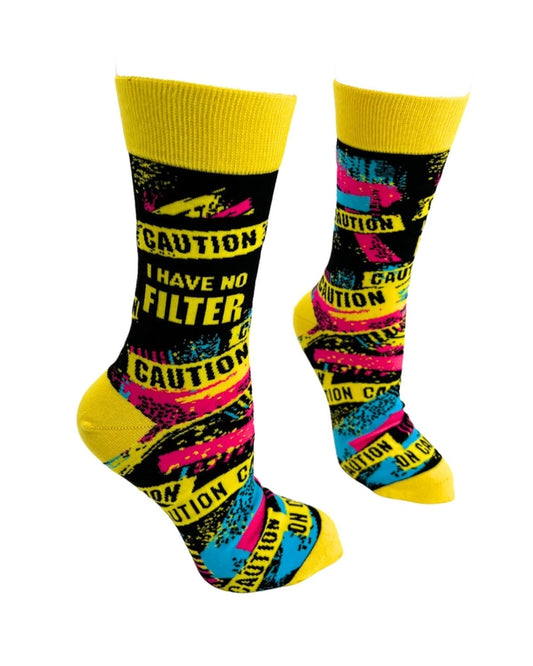 Bright yellow socks with “Caution” tape print and bold phrase: “I have no filter”