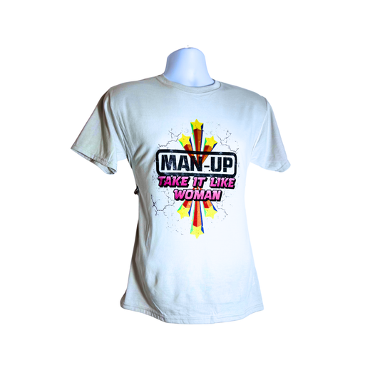 White unisex t-shirt with retro starburst design and text “Man Up – Take It Like a Woman,” displayed on plain white background.