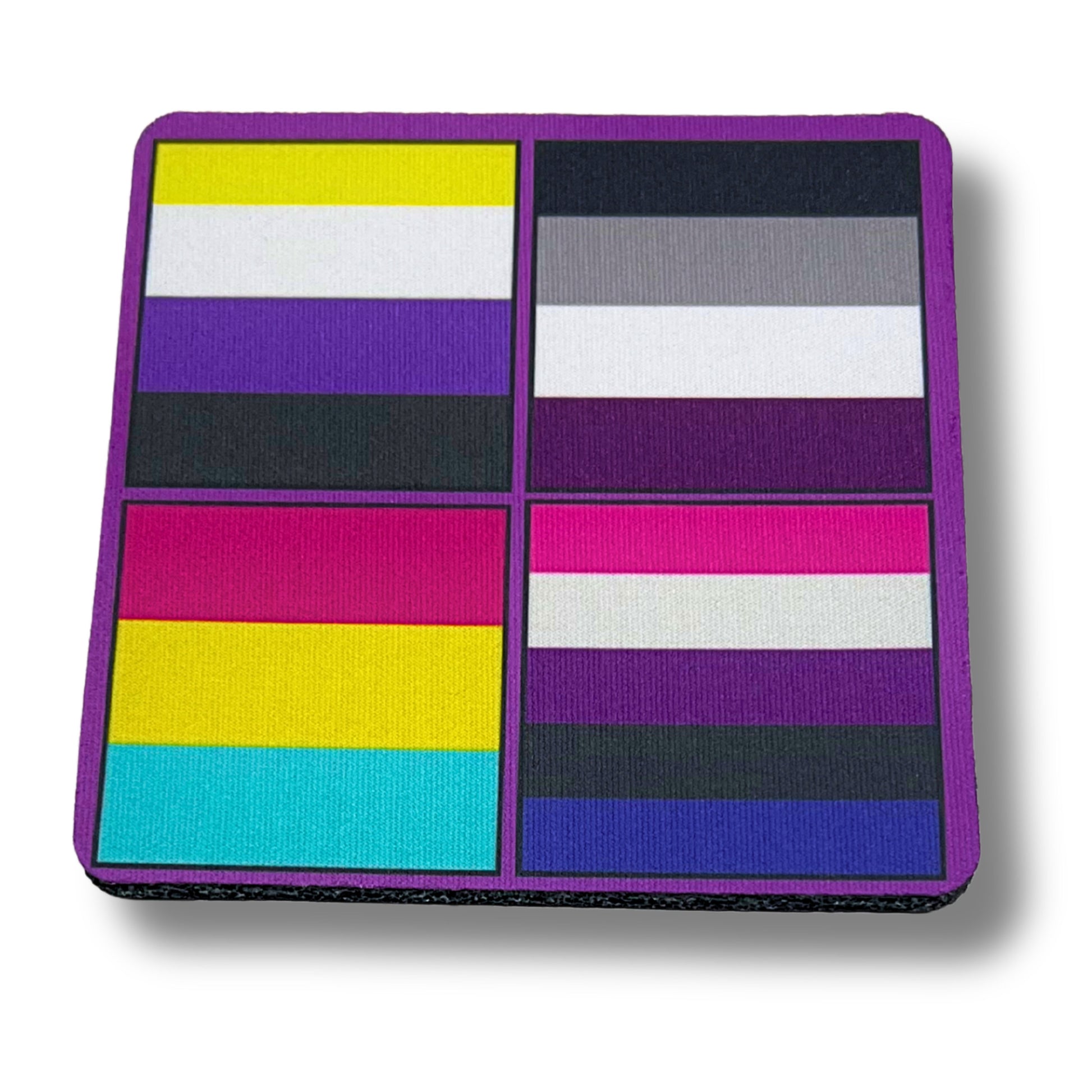 Square coaster featuring four LGBTQ+ pride flag designs in bold colors on a purple border.