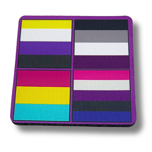 Square coaster featuring four LGBTQ+ pride flag designs in bold colors on a purple border.