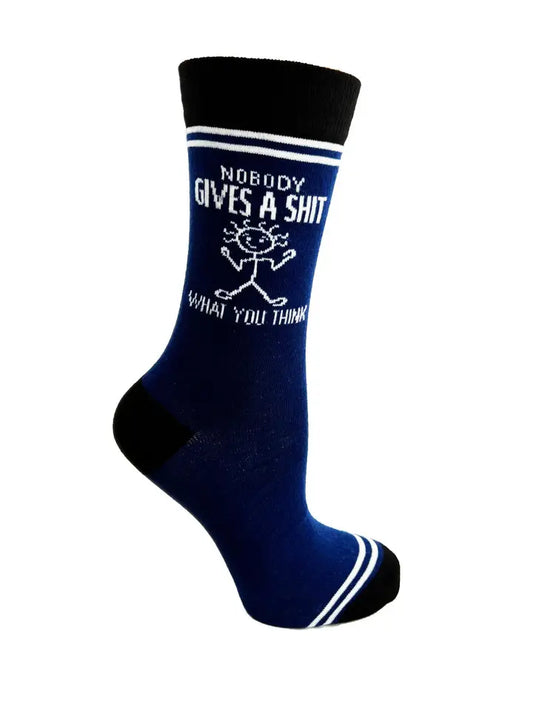 Dark blue crew socks with white stick figure and bold text: “Nobody gives a shit what you think”