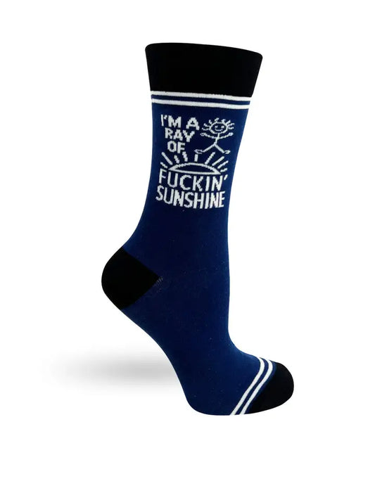 Navy blue crew socks with sunshine graphic and bold white lettering: “I’m a ray of fuckin’ sunshine”