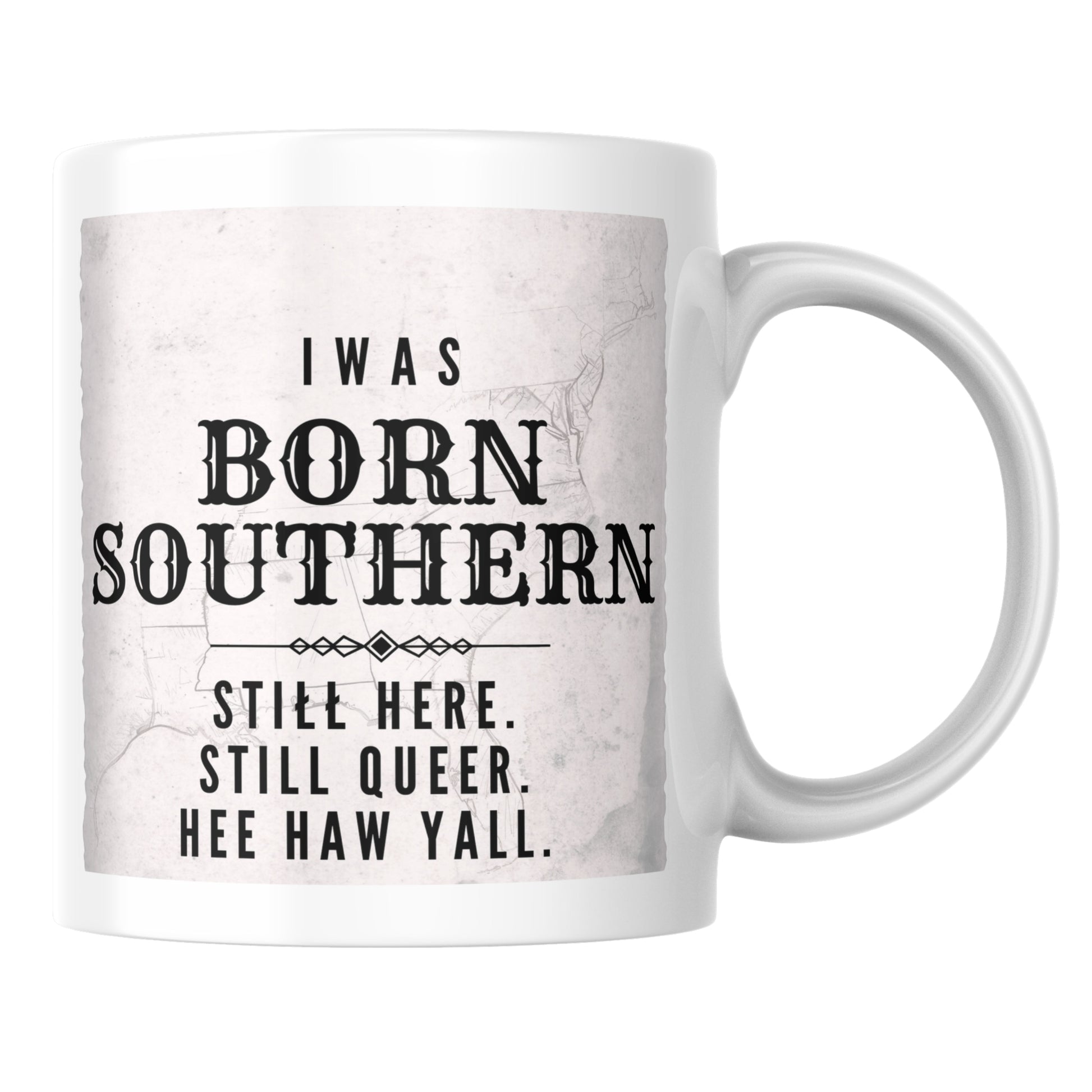 Primary: White ceramic mug with "Born Southern Still Here Still Queer Hee Haw Y'all" design on a clean white background. Secondary: White ceramic mug with design on turquoise background with yellow stars and Designed by Rusty logo. Lifestyle: White ceramic mug with design held in hands wearing a gray sweater.